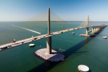 Aerial view of Sunshine Skyway Bridge over Tampa Bay in Florida with moving traffic. Concept of...