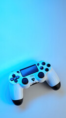 Gamepad on abstract background with light effects © Inna Vlasova