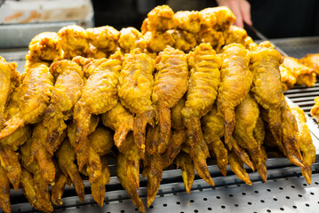 Deep fried chicken wing sell in street market