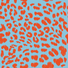Seamless ikat leopard pattern on blue background.
