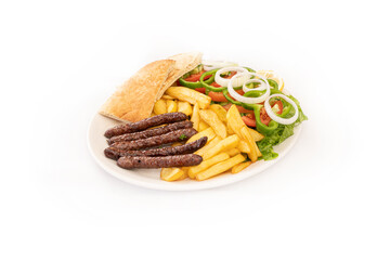 grilled sausages with french fries and salad