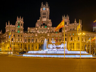 Fototapeta na wymiar Madrid City Hall at night with the Cibeles fountain.