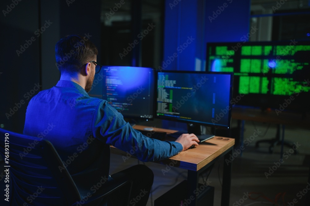 Wall mural it technician person with technology for typing code, future and data analytics