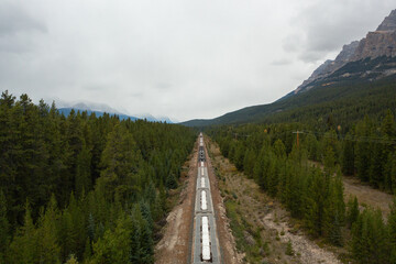 Fototapeta na wymiar Train tracks crossing the rocky mountains of Canada