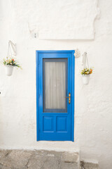 Charming blue door in puglia, Apulia, Italy