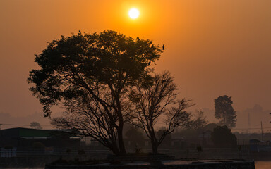 sunrise ovtravel, nature, asia, tourism, lake, river, water, gloomy, sunrise, sunset, sky, sun, ,er the Taudah lake in kathmandu, Nepal.