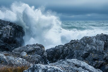 Dramatic waves crashing against rugged cliffs under overcast skies, showcasing nature's power and beauty.