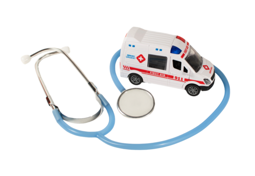 A toy ambulance and a stethoscope are on a table for emergency concept.