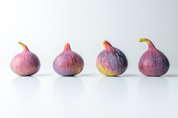 Composition with whole figs on white table. Food concept.
