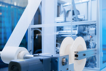 Automatic machine for manufacture of sterile medical masks and bandage made of non woven material. Production surgical kits for operations