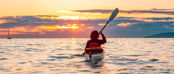 Kayaking at Colorful Sunset in Vancouver, BC, Canada
