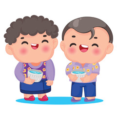 Thai kid playing with water on Songkran day