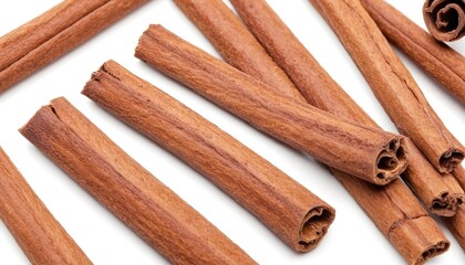 broken cinnamon sticks isolated on white background