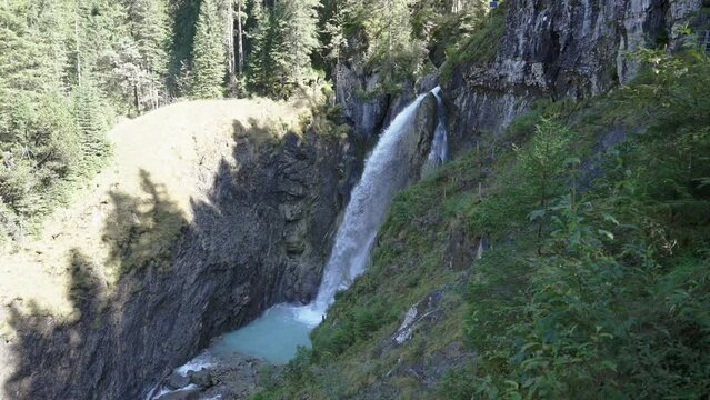 Waterfall Reichenbach falls flowing in Rosenlaui Gletscherschlucht at Switzerland
