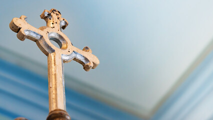 Wooden cross in church. Crucifix. Copy space