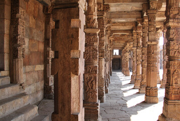 Ancient colonnade inside the Qutub Minar complex, Delhi, India
