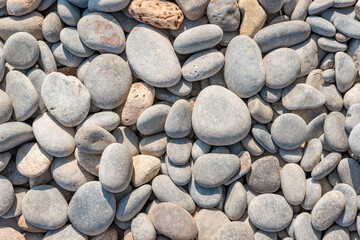 Abstract nature background with round gray pebbles.