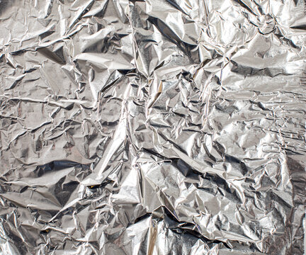 Overhead of crumpled tin foil