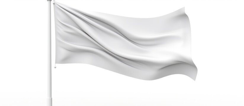 A white rectangle flaunts on a pole, waving in the wind. The stark monochrome flag creates a striking image against the blue sky