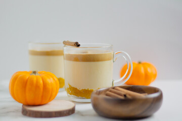 Pumpkin Latte on white background. Autumn concept.