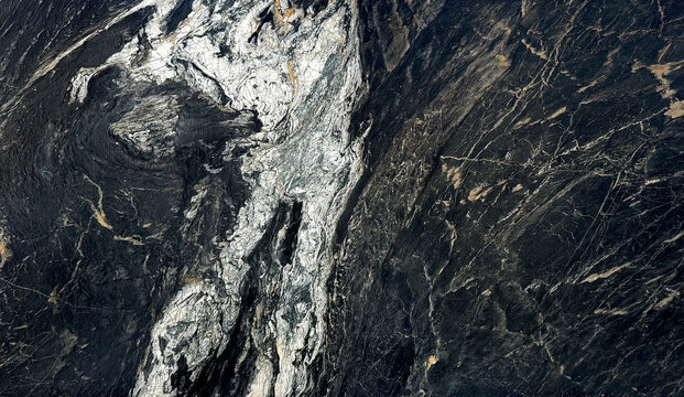 Natural black and white marble slab pattern in rough textured finishes, Fusion Black Panda marble with white veinings, rough stone texture. Seamless pattern.