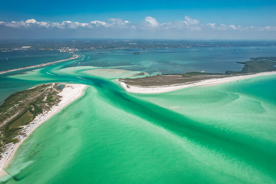 Island. Florida beaches. Panorama of Honeymoon Island State Park FL. Spring Break or summer vacation. Turquoise color of salt water. Ocean or Gulf of Mexico. Tropical Nature. Drone photo. Aerial view