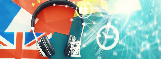 Background concept polyglot. Headphones and flag. The study of foreign subjects. Audiobooks in a foreign language.