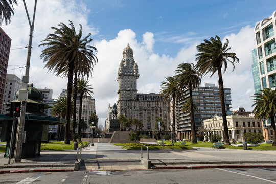 A beautiful day with clouds in the blue sky in the historic center of Montevideo, Uruguay, with Salvo Palace in the background
