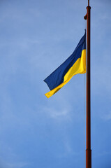 yellow-blue flag of Ukraine against the sky