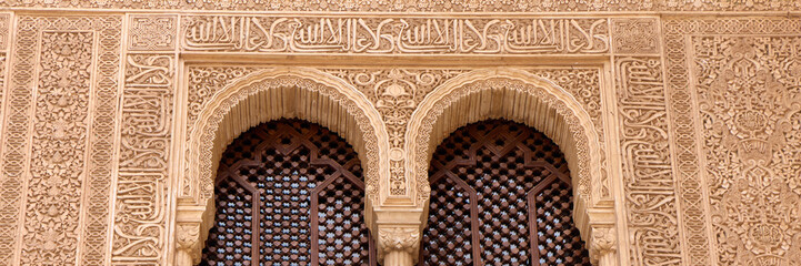 Richly detailed Arabic style wall decorations in the Royal Nazaries Palace in Alhambra, Granada,...