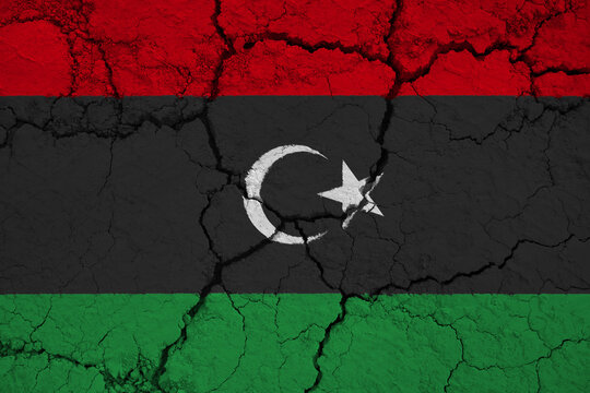 Close-Up of a Wrinkled and Cracked Old State of Libya Flag