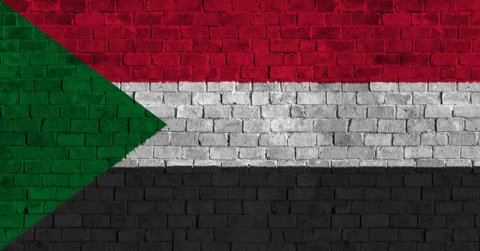 Republic of the Sudan Flag Over a Grunge Brick Background