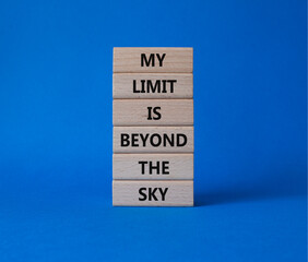 My limit is beyond the sky symbol. Wooden blocks with words My limit is beyond the sky. Beautiful blue background. Business concept. Copy space.