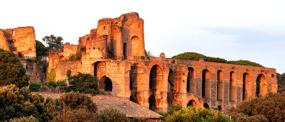  Sunset over the archaeological site of the Palatine, one of the seven hills on which Rome was...