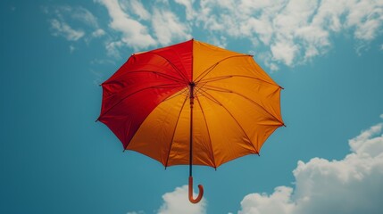 An umbrella in color against a sky. Mixed media.