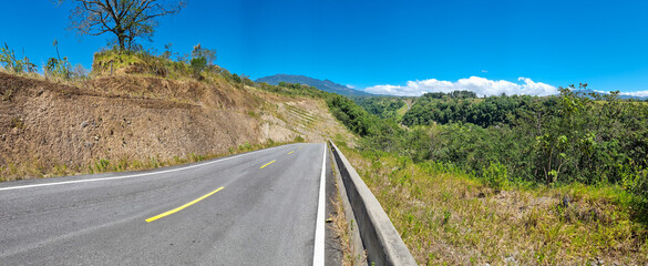 Panama, Boquete, road in the canyon with a view to the volcano