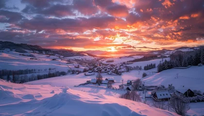 Fototapeten Majestic winter sunrise over snowy village © Minerva Studio