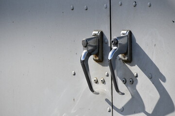 Door handles to back of large van. Locking mechanism.