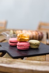 Colorful  Macaroons: Close-Up Elegance with a Natural Backdrop