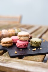 Colorful  Macaroons: Close-Up Elegance with a Natural Backdrop