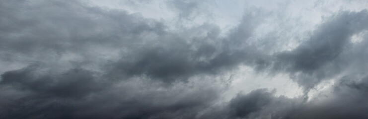 Dark clouds covered the sky