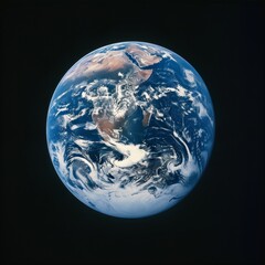Naklejka premium A stunning view of Earth from space, showcasing the blue oceans, green lands, and surrounded by stars.