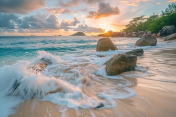 Water waves crash on beach rocks at sunset, natures art - obrazy, fototapety, plakaty