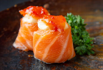 Sushi Joe | Sushi wrapped in a slice of salmon with cream cheese and pepper jelly
