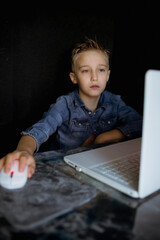 child with laptop