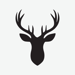 Black vector silhouette of a deer head with antlers isolated on a white background