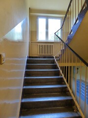Staircase of the old block, view of the stairs and window