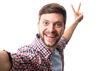 Happy young man taking a selfie photo. Isolated on transparent 