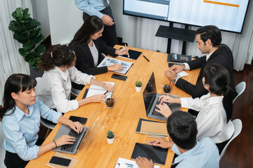 Project manager planning schedules for business task at meeting room, Gantt chart software show on...