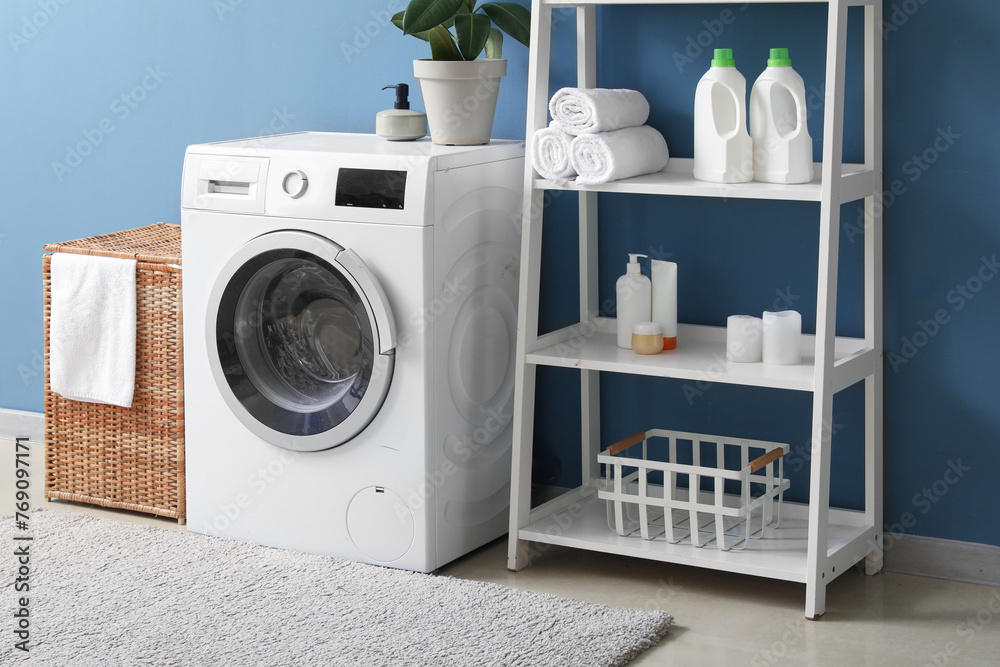 Sticker Interior of room with laundry basket, washing machine and shelf unit